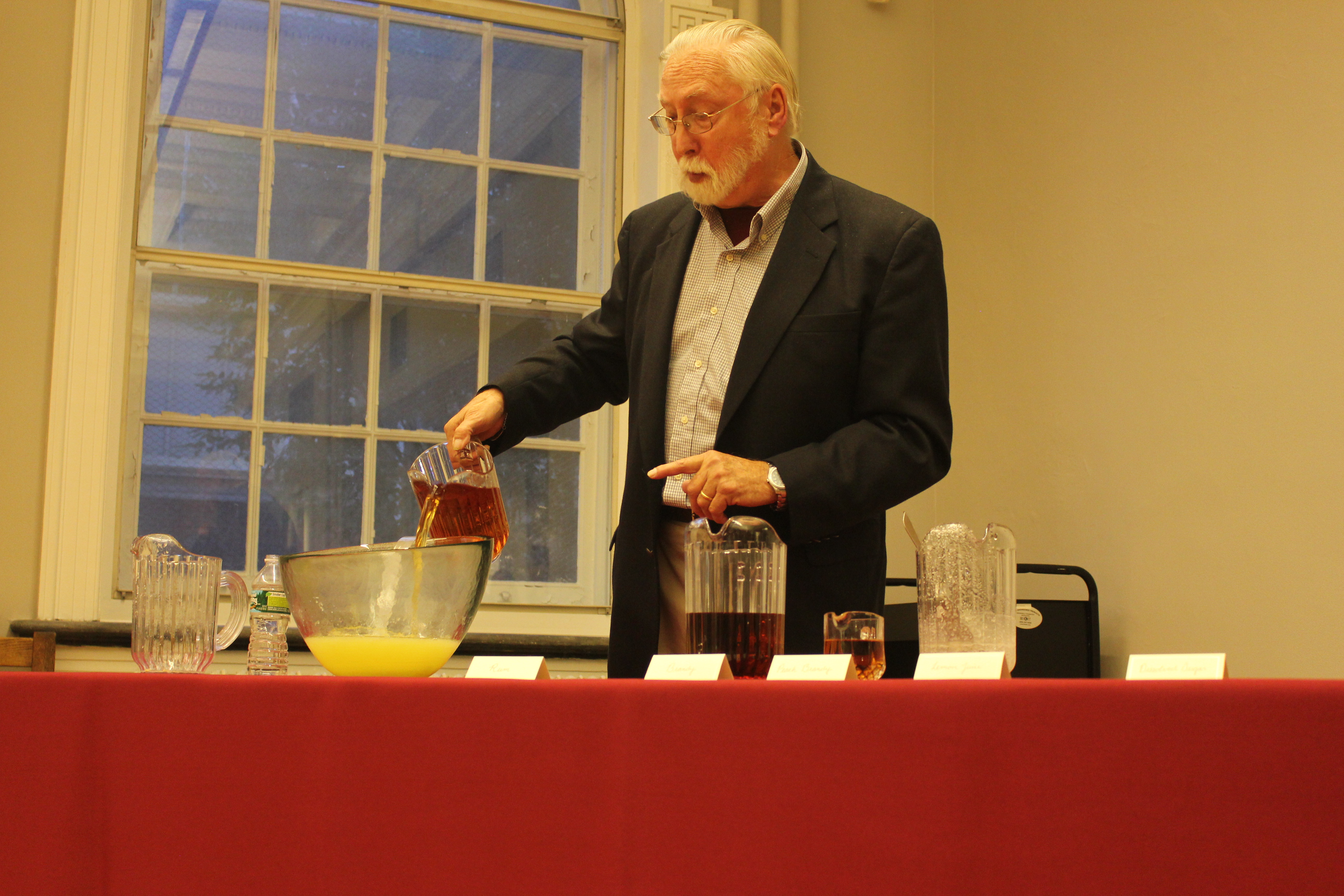 Joseph Carlin demonstrates how to make a traditional Fish House Punch using sugar, fresh lemon juice, brandy, peach brandy, and rum.