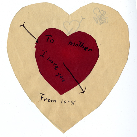 Handmade Valentine made from red and white paper hearts addressed "To Mother" and inscribed "I love you."