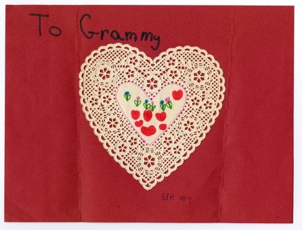 Handmade Valentine addressed "To Grammy" made from a heart-shaped doily.
