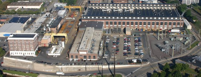 An aerial view of hte Scranton Army Ammunition plant, showing a number of rectangular buildings and a large parking lot. Image from Army.mil and reproduced under Creative Commons 2.0.